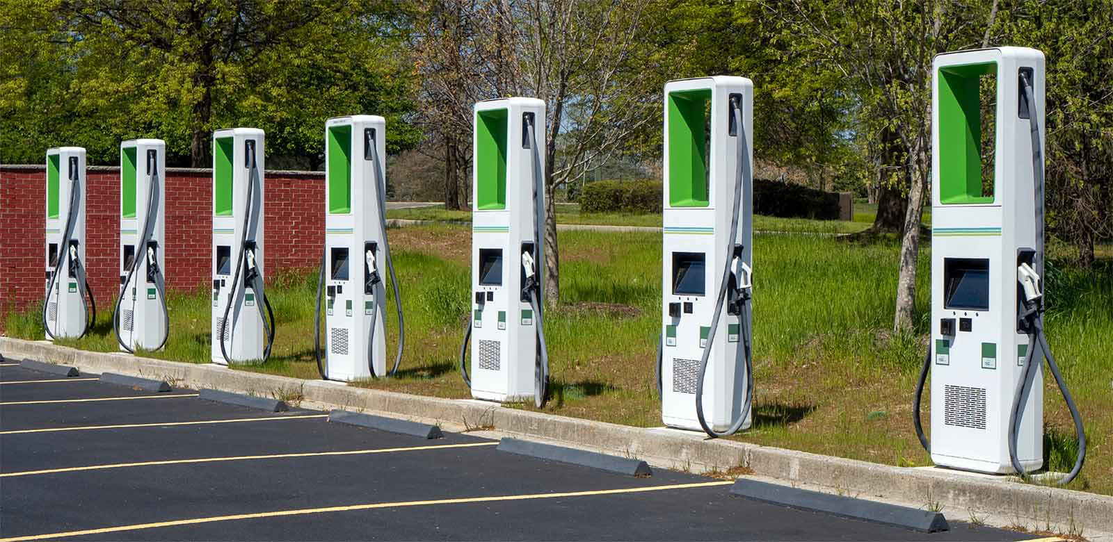 Row of charging stations in parking lot