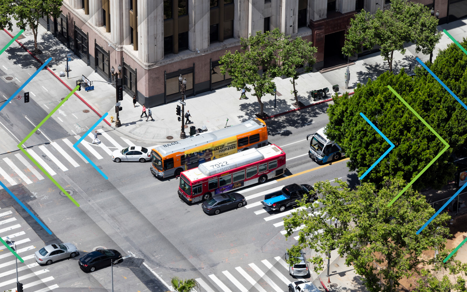 An aerial photograph of two buses in downtown los angeles