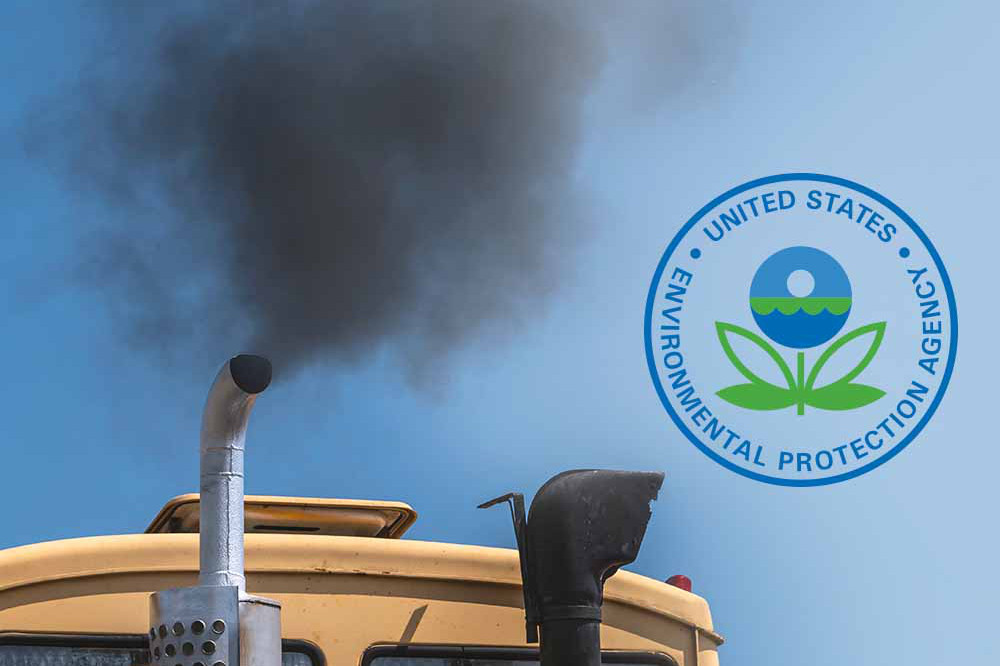 Truck with black exhaust, epa logo superimposed over blue sky