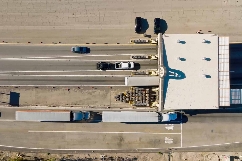 Aerial image of Trucks at checkpoint on California highway