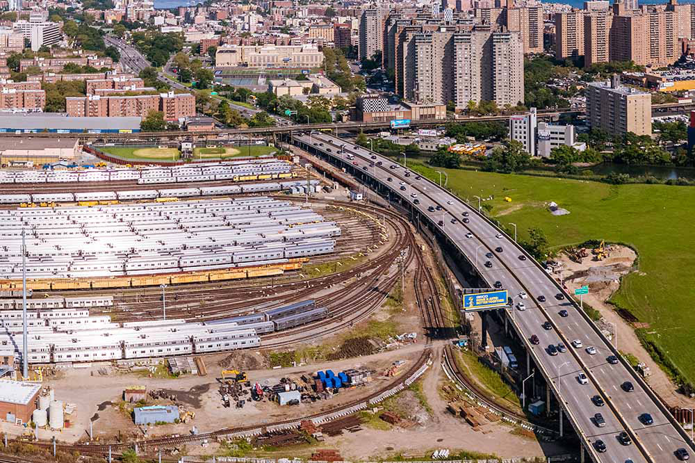 Aerial view of coney island showing train yard and highway